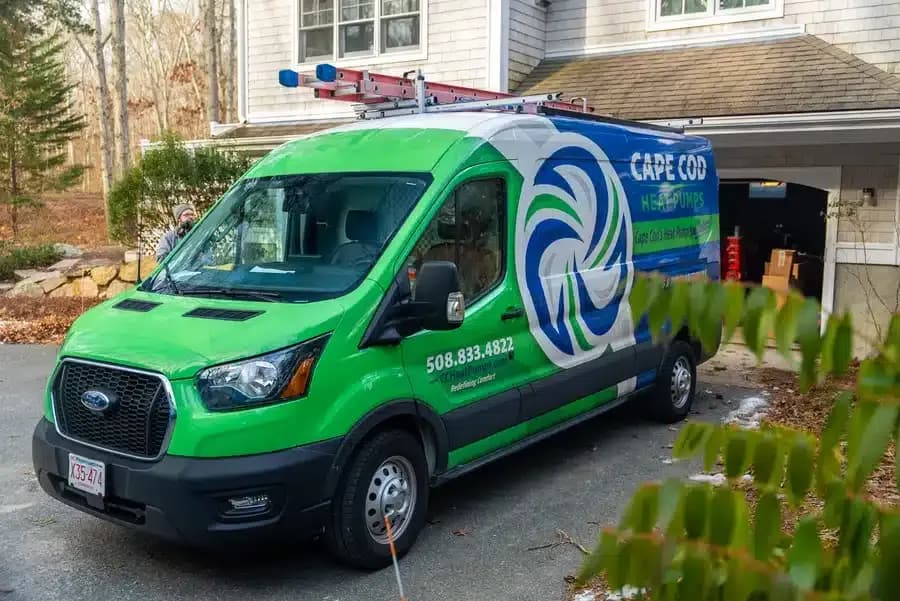 Cape Heating AC & Electric van outside of residential home on Cape Cod, MA.
